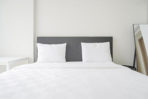 Nice and Homey 1BR at Gold Coast Apartment By Travelio